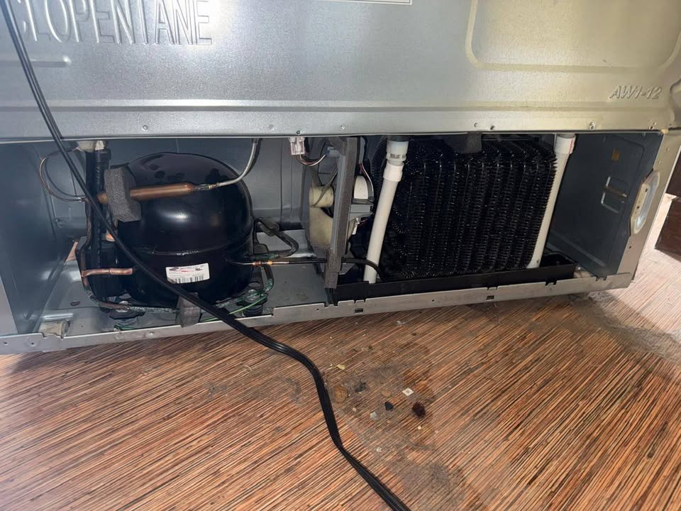 Refrigerator compressor service — condenser coils and refrigerant lines